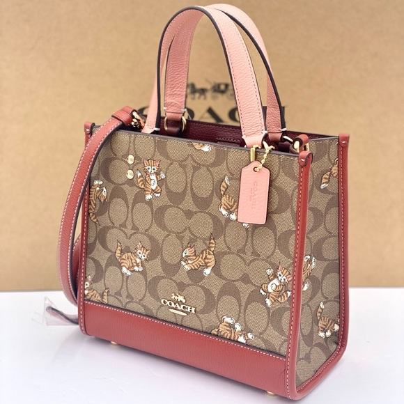 Coach Handbags - Coach Dempsey Tote 22 Crossbody
Satchel With Dancing Kitten Print